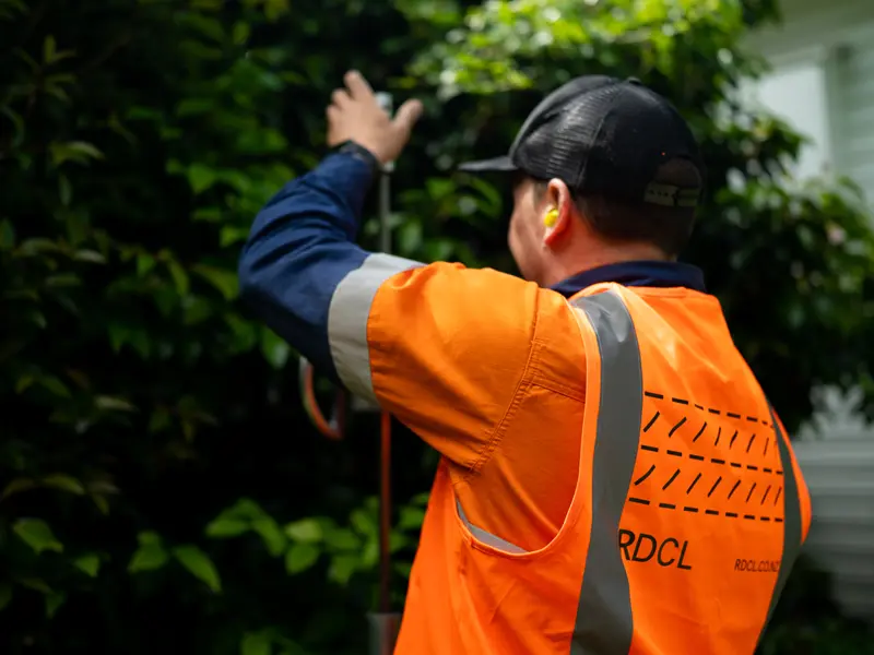 An RDCL ground investigations team member carrying out geotechnical soil testing